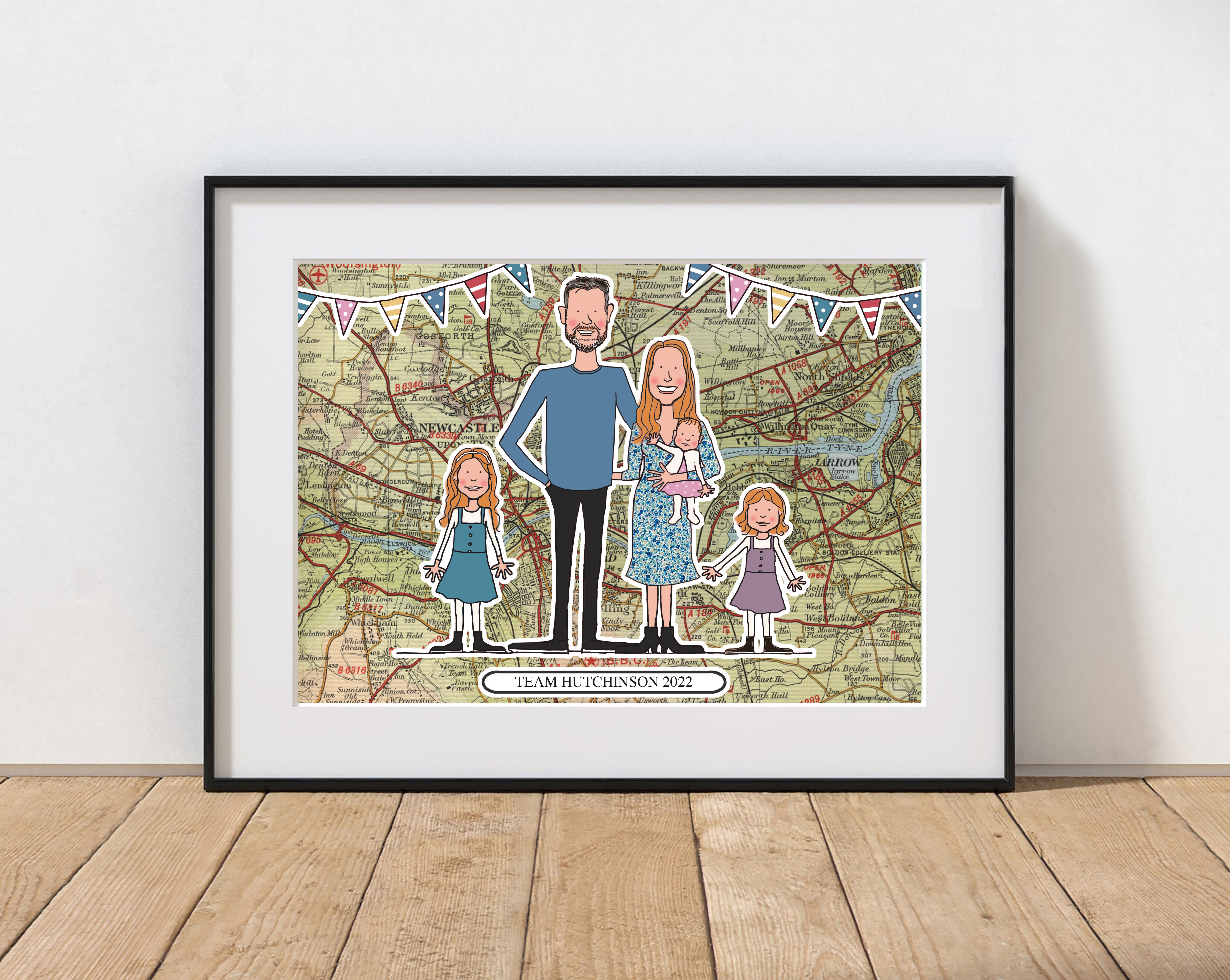 Framed illustrated family portrait over a vintage map background